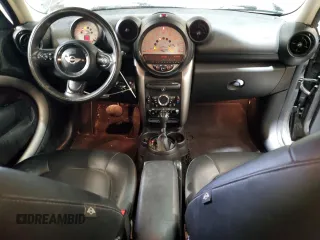2014 MINI Countryman with VIN WMWZB3C59EWR42124, listed as a Copart auction lot 57830395 with 125,000 mi miles and Salvage title. Bid and sale history available at DreamBid. Image 8.