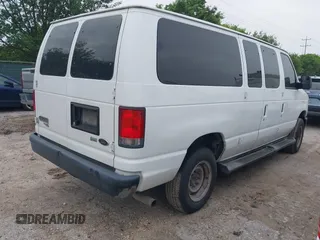 2014 Ford Econoline Passenger XL with VIN 1FBNE3BL7EDA33078, listed as a IAAI auction lot 41938472 with 191,745 mi miles. Bid and sale history available at carsss.com. Image 4.