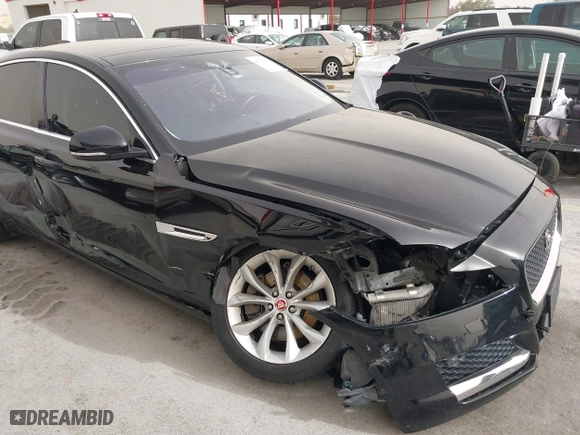 2019 Jaguar XF 25t Premium with VIN SAJBD4FX4KCY79210, listed as a IAAI auction lot 41716178 with 76,314 mi miles. Bid and sale history available at carsss.com. Image 18.