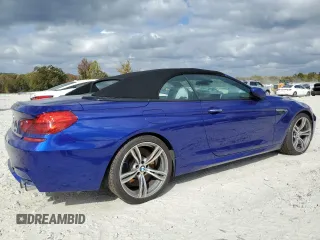 2012 BMW M6 z VIN WBSLZ9C5XCC985501, wystawiony jako Copart lot #78783464 z przebiegiem 80 961 mil mil oraz Czysty tytuł • Clean title. Historia ofert i sprzedaży dostępna na DreamBid. Obrazek 3.