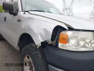 2006 Ford F-150 XL with VIN 1FTRF14W26NB02079, listed as a IAAI auction lot 42023955 with 238,047 mi miles. Bid and sale history available at carsss.com. Image 6.