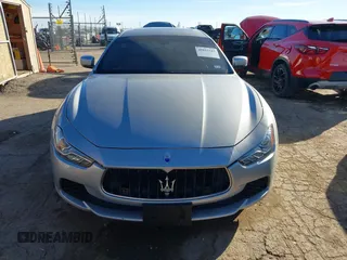 2015 Maserati Ghibli z VIN ZAM57XSA7F1135961, wystawiony jako IAAI lot #40831583 z przebiegiem 89 671 mil mil oraz . Historia ofert i sprzedaży dostępna na DreamBid. Obrazek 12.