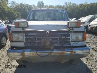 1990 Ford F-250 with VIN 1FTHF26H2LNA64235, listed as a Copart auction lot 74459134 with 249,821 mi miles and Salvage Title. Bid and sale history available at carsss.com. Image 5.