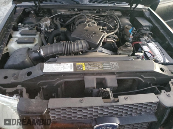 2002 Ford Explorer Sport Value z VIN 1FMYU60E92UC86847, wystawiony jako Copart lot #77086944 z przebiegiem 147 827 mil mil oraz Szkoda całkowita • Salvage title. Historia ofert i sprzedaży dostępna na DreamBid. Obrazek 12.
