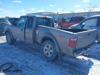 2003 Ford Ranger XL Fleet with VIN 1FTZR45E13TA21144, listed as a IAAI auction lot 41641064 with 139,921 mi miles. Bid and sale history available at carsss.com. Image 3.
