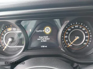 2025 Jeep Wrangler Sport S with VIN 1C4PJXDG9SW559915, listed as a IAAI auction lot 42653116 with 1,730 mi miles and . Bid and sale history available at DreamBid. Image 7.