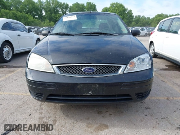 2007 Ford Focus S z VIN 1FAHP34N37W161610, wystawiony jako IAAI lot #42370742 z przebiegiem Nie podano mil oraz . Historia ofert i sprzedaży dostępna na DreamBid. Obrazek 6.