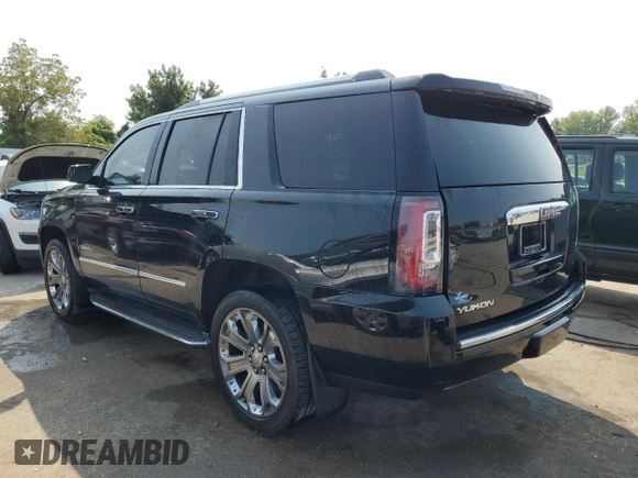 2015 GMC Yukon Denali with VIN 1GKS2CKJXFR547358, listed as a Copart auction lot 63906734 with 163,980 mi miles and Salvage Title. Bid and sale history available at carsss.com. Image 2.