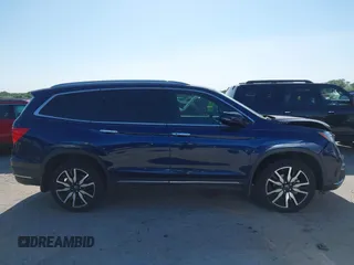 2020 Honda Pilot Elite with VIN 5FNYF6H02LB054348, listed as a IAAI auction lot 42302525 with 43,916 mi miles and . Bid and sale history available at DreamBid. Image 13.