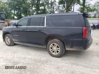 2018 Chevrolet Suburban LT with VIN 1GNSCHKC8JR331662, listed as a Copart auction lot 55561545 with 164,213 mi miles and Salvage title. Bid and sale history available at DreamBid. Image 2.