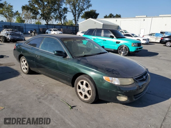 2000 Toyota Solara SE with VIN 2T1CF22P1YC312427, listed as a Copart auction lot 72077714 with 288,269 mi miles and Salvage Title. Bid and sale history available at carsss.com. Image 4.