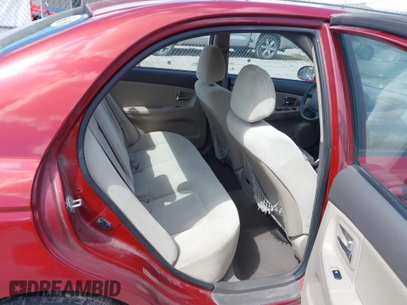 2009 Kia Spectra EX with VIN KNAFE221495665378, listed as a IAAI auction lot 42036945 with 153,254 mi miles. Bid and sale history available at carsss.com. Image 8.