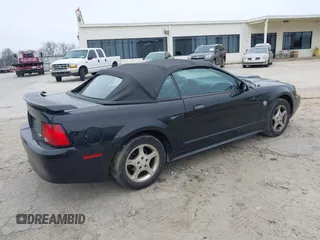 2004 Ford Mustang Deluxe with VIN 1FAFP44454F110688, listed as a IAAI auction lot 41371035 with 188,754 mi miles. Bid and sale history available at carsss.com. Image 4.