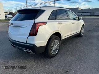 2021 Cadillac XT5 AWD Sport z VIN 1GYKNGRS9MZ200684, wystawiony jako Copart lot #78047424 z przebiegiem 2 713 mil mil oraz Czysty tytuł • Clean title. Historia ofert i sprzedaży dostępna na DreamBid. Obrazek 4.