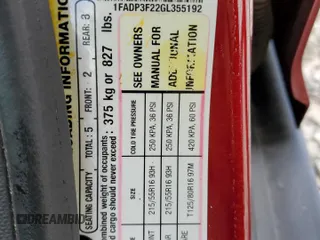 2016 Ford Focus SE z VIN 1FADP3F22GL355192, wystawiony jako Copart lot #56614225 z przebiegiem 56 214 mil mil oraz Szkoda całkowita • Salvage title. Historia ofert i sprzedaży dostępna na DreamBid. Obrazek 13.