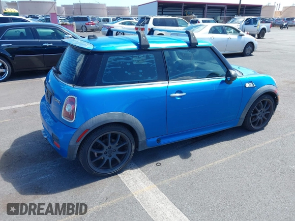 2008 MINI Hardtop S with VIN WMWMF73518TT86953, listed as a IAAI auction lot 42239292 with 107,513 mi miles and . Bid and sale history available at DreamBid. Image 4.