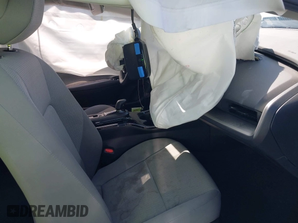 2023 Toyota Prius LE with VIN JTDACAAU7P3013923, listed as a IAAI auction lot 42600973 with 33,958 mi miles and . Bid and sale history available at DreamBid. Image 5.