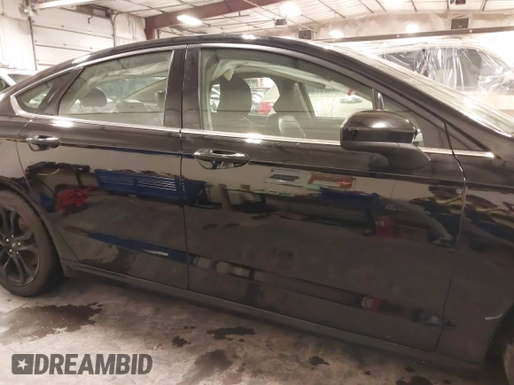 2019 Ford Fusion SE with VIN 3FA6P0HD5KR284103, listed as a IAAI auction lot 41477133 with 90,722 mi miles and . Bid and sale history available at carsss.com. Image 13.