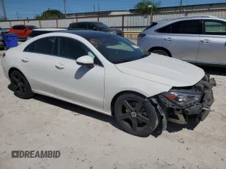 2020 Mercedes-Benz CLA 250 with VIN WDD5J4HBXLN034377, listed as a Copart auction lot 49379054 with 61,673 mi miles and . Bid and sale history available at DreamBid. Image 4.