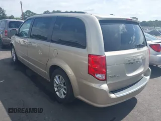 2014 Dodge Grand Caravan SXT z VIN 2C4RDGCG6ER162533, wystawiony jako IAAI lot #42251591 z przebiegiem 70 666 mil mil oraz . Historia ofert i sprzedaży dostępna na DreamBid. Obrazek 3.