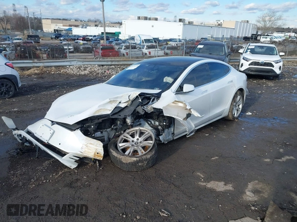 2021 Tesla Model S Long Range Plus with VIN 5YJSA1E20MF426400, listed as a IAAI auction lot 41453704 with Not provided miles and . Bid and sale history available at DreamBid. Image 2.