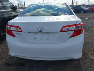 2014 Toyota Camry L with VIN 4T4BF1FK1ER424875, listed as a IAAI auction lot 42025877 with 113,919 mi miles. Bid and sale history available at carsss.com. Image 16.