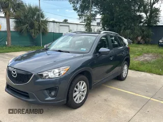 2013 Mazda CX-5 Sport with VIN JM3KE4BE7D0141588, listed as a Copart auction lot 66138585 with 124,920 mi miles and Clean title. Bid and sale history available at DreamBid. Image 2.