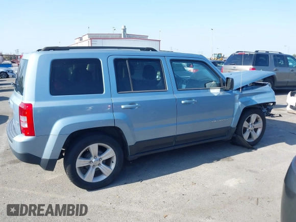 2014 Jeep Patriot Latitude with VIN 1C4NJPFB5ED536401, listed as a IAAI auction lot 42383752 with 68,657 mi miles and . Bid and sale history available at DreamBid. Image 14.