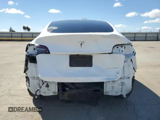 2021 Tesla Model Y Long Range z VIN 5YJYGAEE4MF267156, wystawiony jako Copart lot #50634185 z przebiegiem 72 850 mil mil oraz Szkoda całkowita • Salvage title. Historia ofert i sprzedaży dostępna na DreamBid. Obrazek 6.
