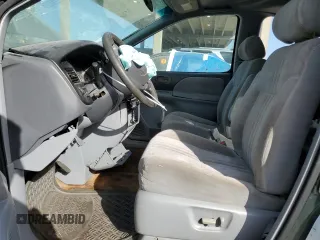 2000 Toyota Sienna LE z VIN 4T3ZF13CXYU287503, wystawiony jako Copart lot #43746115 z przebiegiem Nie podano mil oraz Szkoda całkowita • Salvage title. Historia ofert i sprzedaży dostępna na DreamBid. Obrazek 7.