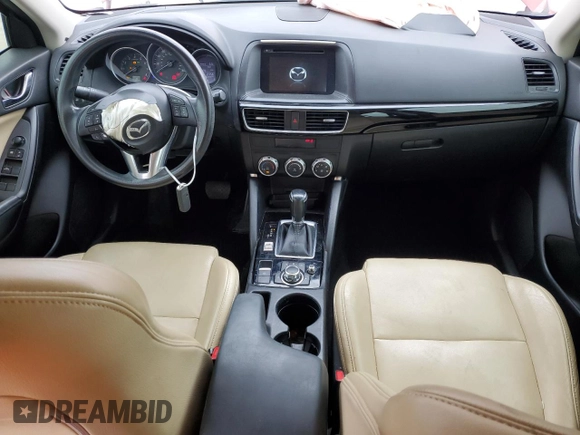 2016 Mazda CX-5 Sport with VIN JM3KE2BY5G0811819, listed as a Copart auction lot 51172425 with 131,644 mi miles and Salvage Title. Bid and sale history available at carsss.com. Image 8.