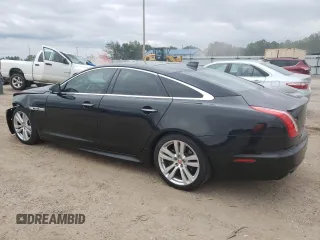 2017 Jaguar XJ with VIN SAJWA1C73H8W10544, listed as a Copart auction lot 70025724 with 64,437 mi miles and Salvage Title. Bid and sale history available at carsss.com. Image 2.