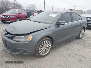 2014 Volkswagen Jetta TDI with VIN 3VWLL7AJ0EM389924, listed as a IAAI auction lot 41271290 with 241,452 mi miles and . Bid and sale history available at DreamBid. Image 2.