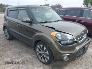 2012 Kia Soul + with VIN KNDJT2A62C7465580, listed as a IAAI auction lot 41717664 with 70,699 mi miles. Bid and sale history available at carsss.com. Image 1.