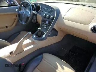 2006 Pontiac Solstice z VIN 1G2MB33BX6Y103970, wystawiony jako Copart lot #69794974 z przebiegiem 146 881 mil mil oraz Szkoda całkowita • Salvage title. Historia ofert i sprzedaży dostępna na DreamBid. Obrazek 8.