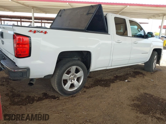 2015 Chevrolet Silverado 1500 LT with VIN 1GCVKREC1FZ415386, listed as a IAAI auction lot 42142990 with 165,409 mi miles and . Bid and sale history available at DreamBid. Image 4.