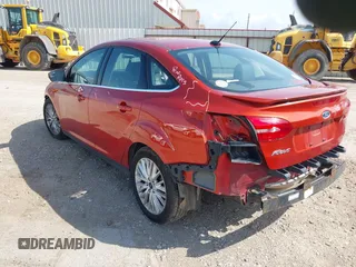 2018 Ford Focus Titanium with VIN 1FADP3J20JL281141, listed as a IAAI auction lot 42437424 with 113,499 mi miles and . Bid and sale history available at DreamBid. Image 3.