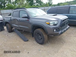 2021 Toyota Tacoma SR with VIN 5TFCZ5AN8MX266972, listed as a IAAI auction lot 42511666 with 56,378 mi miles and . Bid and sale history available at DreamBid. Image 1.