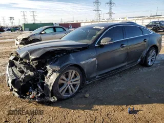2014 Jaguar XJ Portfolio with VIN SAJWJ2GD6E8V73491, listed as a Copart auction lot 42472345 with 68,747 mi miles and Salvage title. Bid and sale history available at DreamBid. Image 1.