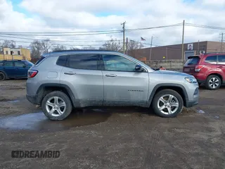2023 Jeep Compass Latitude with VIN 3C4NJDBN7PT532099, listed as a IAAI auction lot 41485624 with 10,564 mi miles and . Bid and sale history available at DreamBid. Image 12.