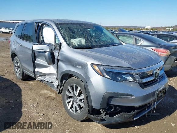 2022 Honda Pilot EX-L with VIN 5FNYF6H54NB018613, listed as a IAAI auction lot 41566973 with 56,173 mi miles. Bid and sale history available at carsss.com. Image 1.