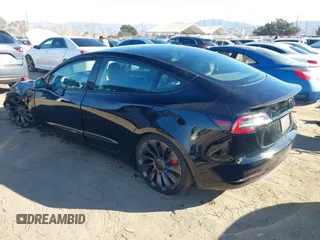 2021 Tesla Model 3 Performance with VIN 5YJ3E1EC6MF999321, listed as a IAAI auction lot 41417451 with 20,562 mi miles and . Bid and sale history available at carsss.com. Image 3.