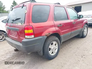 2003 Ford Escape XLT Popular 2 with VIN 1FMYU93153KB78622, listed as a IAAI auction lot 42342301 with Not provided miles and . Bid and sale history available at DreamBid. Image 4.