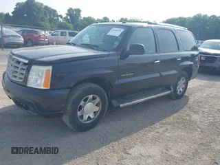 2005 Cadillac Escalade z VIN 1GYEK63N85R238220, wystawiony jako IAAI lot #42498575 z przebiegiem 229 529 mil mil oraz . Historia ofert i sprzedaży dostępna na DreamBid. Obrazek 2.