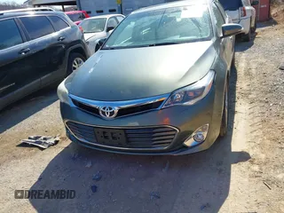 2014 Toyota Avalon Limited z VIN 4T1BK1EB0EU118032, wystawiony jako IAAI lot #41864586 z przebiegiem 72 477 mil mil oraz . Historia ofert i sprzedaży dostępna na DreamBid. Obrazek 13.