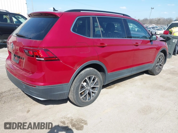 2019 Volkswagen Tiguan SE with VIN 3VV3B7AX3KM130075, listed as a IAAI auction lot 41807584 with 57,308 mi miles and . Bid and sale history available at DreamBid. Image 4.