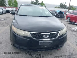 2012 Kia Forte EX with VIN KNAFU4A28C5490102, listed as a IAAI auction lot 42164395 with 167,444 mi miles. Bid and sale history available at carsss.com. Image 6.