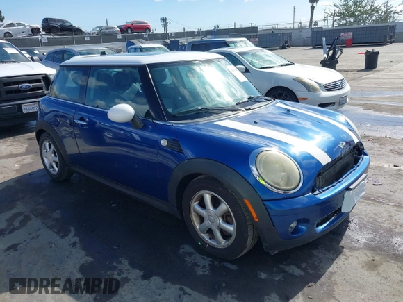 2009 MINI Hardtop with VIN WMWMF335X9TW71208, listed as a IAAI auction lot 41535653 with 148,660 mi miles and . Bid and sale history available at DreamBid. Image 1.