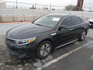 2017 Kia Optima Hybrid with VIN KNAGT4LC8H5008457, listed as a IAAI auction lot 41890144 with 122,340 mi miles. Bid and sale history available at carsss.com. Image 2.