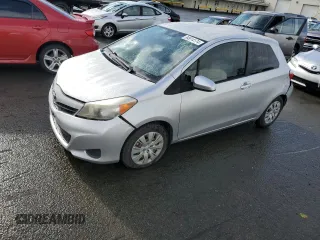 2014 Toyota Yaris L with VIN JTDJTUD39ED576659, listed as a Copart auction lot 84914174 with 67,800 mi miles and Salvage Title. Bid and sale history available at carsss.com. Image 1.